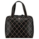 Sac à main en agneau avec couture sauvage Chanel CC noir