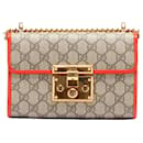 Bolsa crossbody Gucci GG Supreme Padlock marrom