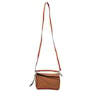 Bolsa Mini Puzzle Loewe em couro de bezerro tan