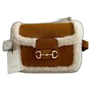 Horsebit 1955 Gucci shearling-trimmed suede shoulder bag