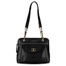 Bolso de cadena de caviar negro con bolsillo frontal de Chanel