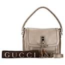 Bolsa de ombro em couro dourado Gucci Bella