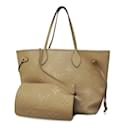 Bolso tote Neverfull MM en Monogram Empreinte de Louis Vuitton en Tourterelle