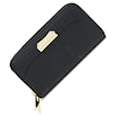 Billetera bi-fold de cuero negro Burberry para mujeres