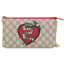 Bolsa/bolsinha de cobra da coleção de férias Gucci GG Supreme