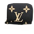 Portafoglio bicolore Monogram Empreinte Louis Vuitton