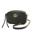 Borsa a spalla trapuntata Gucci GG Marmont con catena