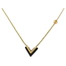 Louis Vuitton Gold and Black Circle Pendant Necklace