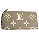 Portefeuille long zippé Monogram Empreinte Louis Vuitton