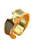 Anillo de pañuelo Hermès en marrón y oro