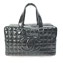 Sac Boston en cuir verni noir Chanel