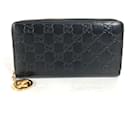 Cartera larga de cuero negro Gucci