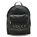 Mochila de cuero con estampado de Gucci