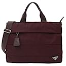 Borsa in nylon bordeaux Prada