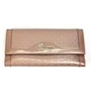 Carteira tri-fold em couro verniz rosa Gucci