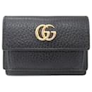 Portefeuille pliant en cuir noir Gucci