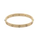 Pulsera Charm Love de Cartier en oro amarillo de 18K