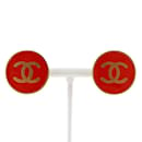 Pendientes de clip rojos chapados en oro de Chanel