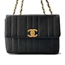 Sac à épaule en cuir caviar noir Chanel