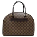 Louis Vuitton Nolita Handbag