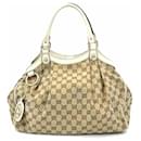 Bolso Gucci GG Canvas Sukey de cuero beige