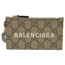 Porte-monnaie Gucci en toile GG beige