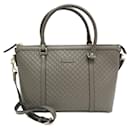 Bolso de cuero gris MicroGuccissima de Gucci