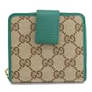 Portefeuille bi-fold Gucci en toile