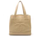 Bolsa tote Chanel Coco Mark em couro caviar bege