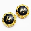 Boucles d'oreilles clips Chanel noires et dorées