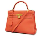 Sac à main Hermes Kelly 32 en rouge orange - Hermès