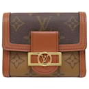 Portefeuille bi-fold Monogram Reverse Louis Vuitton