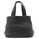 Bolso tote pequeño de cuero perforado Prada