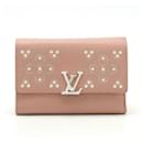 Cartera compacta tri-fold Capucines de Louis Vuitton