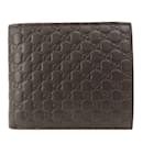 Portefeuille bi-fold Micro Guccissima 544472 de Gucci