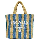 Bolso tote Prada beige y azul a rayas