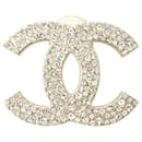 Broche en strass doré Chanel