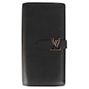 Louis Vuitton Taurillon LV Vertical Wallet