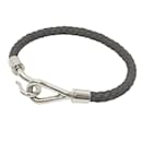 Bracelet charm Tresse Intrecciato en cuir gris Hermes - Hermès