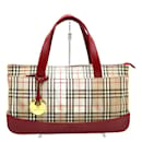 Bolsa de mão em canvas vermelho com estampa Nova Check Shadow da Burberry