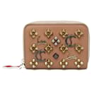 Porta-moedas com studs Panettone de Christian Louboutin