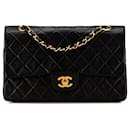 Sac à épaule Chanel Medium Classic en cuir d'agneau noir à double rabat