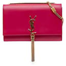 Borsa a tracolla Kate Medium Monogram in pelle rosa di Saint Laurent con frange