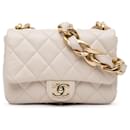 Sac à bandoulière funky town en cuir d'agneau matelassé beige de Chanel