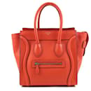 Borsa a mano Celine Luggage Micro Shopper in rosso arancio - Céline