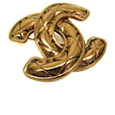 Broche en métal doré Chanel