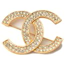 Broche épingle en strass doré Chanel