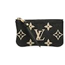 Pochete Clé Bicolor Monogram Empreinte Louis Vuitton