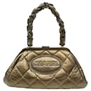 Chanel Matelasse Handbag in Metallic Gold