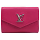 Portefeuille Lock Tri-fold Compact de Louis Vuitton